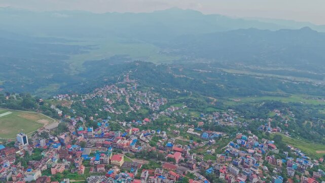 Beautiful hillside view of Tansen Palpa, Nepal, showcasing green mountains, traditional houses, and the peaceful charm of this historic hill town surrounded by nature.