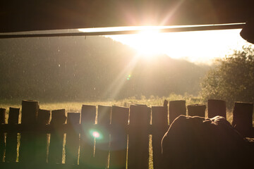 wooden fence on the background of a field