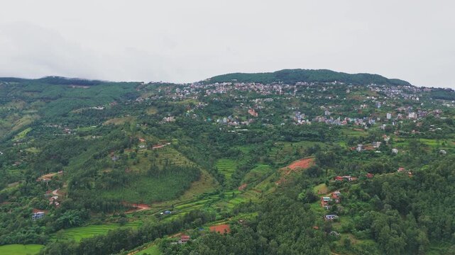 Beautiful hillside view of Tansen Palpa, Nepal, showcasing green mountains, traditional houses, and the peaceful charm of this historic hill town surrounded by nature.