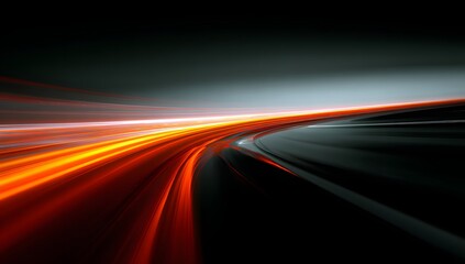 Abstract motion blur of vibrant orange and white light trails streaking across a dark curving road at high speed creating a sense of dynamic movement and energy