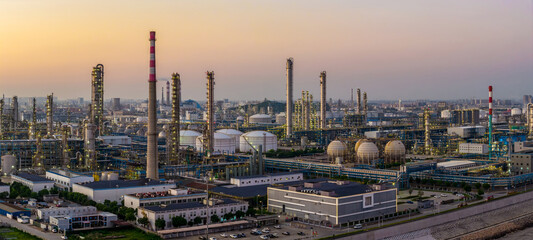 Aerial view of a large oil refinery and chemical plant with storage tanks in a industrial area