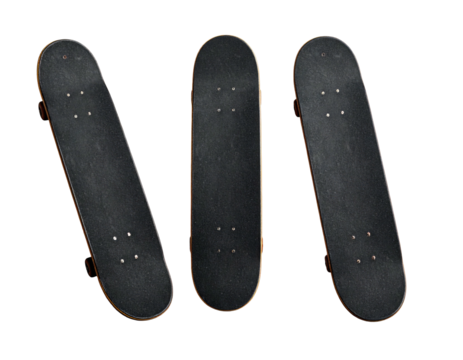 Three skateboards, viewed from below against a stark black background, angled and straight