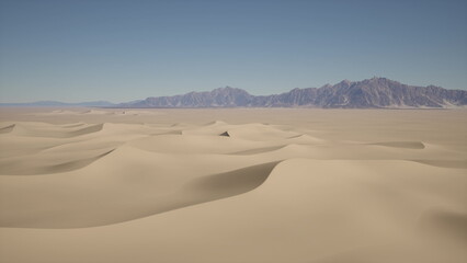 Golden sand stretches endlessly beneath a vibrant blue sky, with undulating dunes creating a tranquil landscape. In the distance, jagged mountains rise against the horizon, adding dramatic depth.