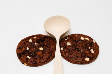 stuck of chocolate brownie cookies on wooden background. Homemade pastry.