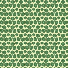 Abstract clover leaves seamless pattern in green and pale yellow