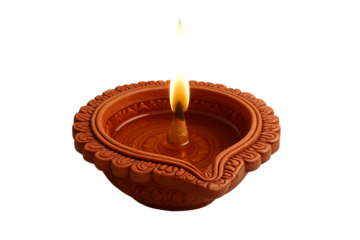 Terracotta clay diya oil lamp with a detailed scalloped border and burning wick, a symbol of light over darkness for happy diwali, isolated on transparent background