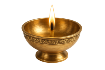 Elegant brass oil lamp or diya with engraved pattern and burning flame, a traditional element of the happy diwali festival, isolated on transparent background