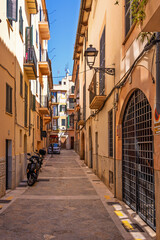 Fototapeta premium Narrow alley in a residential area in an old city