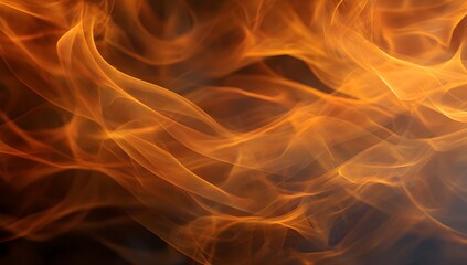 Fototapeta premium Intense abstract swirling orange and yellow flames creating a vibrant dynamic texture with a dark background for dramatic visual effects and energy