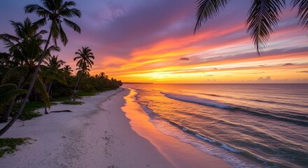 Tropical beach scene at sunset with vibrant sky, calm waves, and palm trees