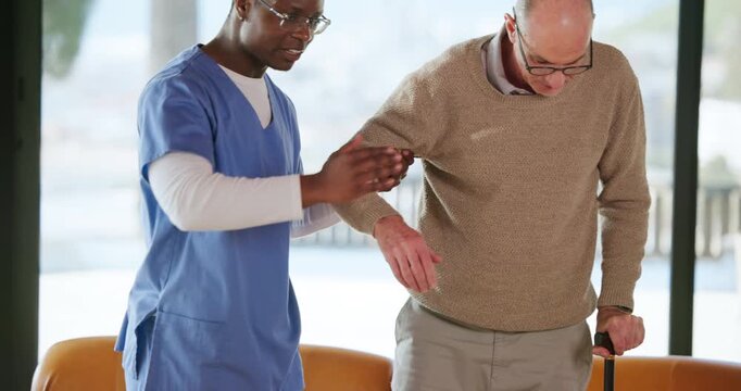 Man, nurse and helping elderly patient with walking stick for assisted living in retirement home. Male people, caregiver or aiding person with a disability for nursing, support or mobility in house