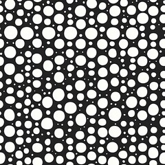 Seamless black and white bubble pattern, abstract geometric circle design.