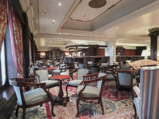 Elegant interior design furnishing bar lounge area onboard cruiseship cruise ship liner in Art Deco...