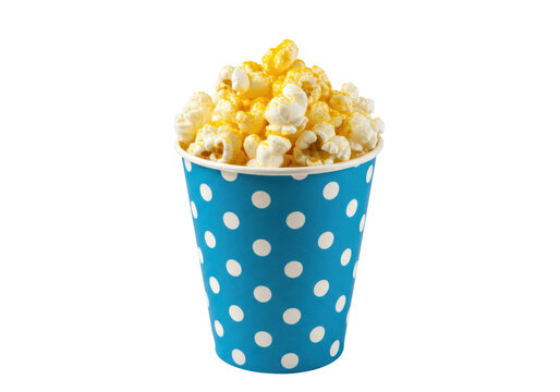 Isolated view of popcorn in a blue polka-dot container, movie or carnival treat