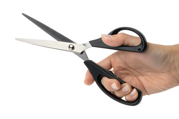 A hand firmly grasps a pair of sharp, open, general purpose scissors with black handles. This transparent png isolated image shows the blades ready for use.