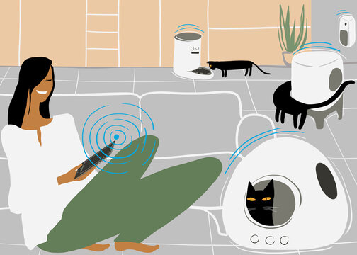 Woman using smart home technology with cat and automation gadgets