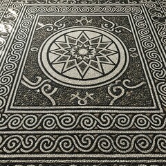 Ancient Mosaic Floor - Intricate Star Design and Swirling Borders.