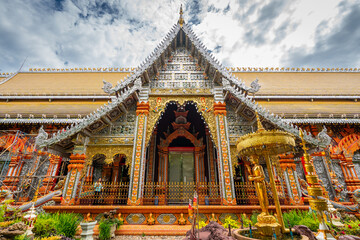 Wat Si Don Mun in Chiang Mai, Thailand, shines with golden details and elegant Lanna architecture, reflecting the beauty and spiritual charm of Northern Thai culture.