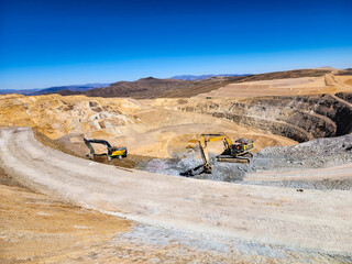 Construction machinery working in open pit mine