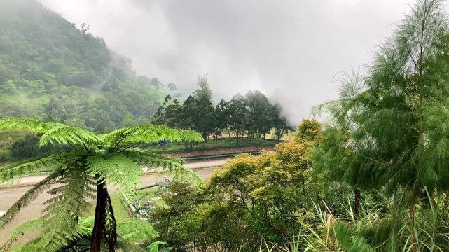 High in the mountains, a geothermal plant for the generation of renewable electricity that is environmentally friendly for nature