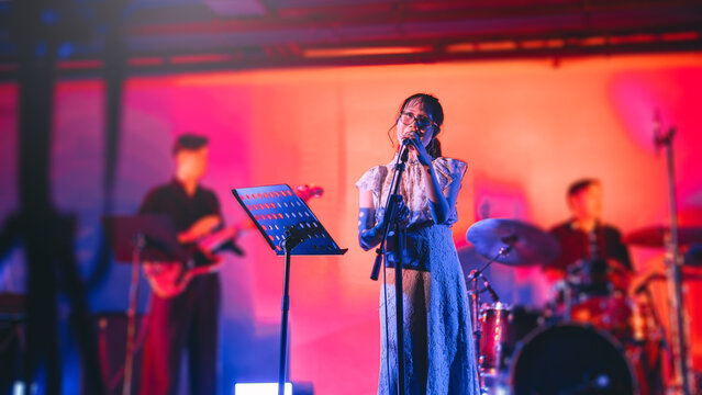 asian woman singer on stage good vibes live performance vocalist singing city pop music at live house