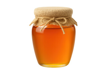 Glass jar filled with golden organic bee honey