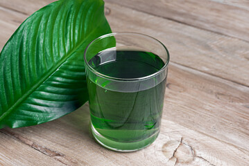 Liquid Chlorophyll Drink. Glass of Chrorophyll Water.