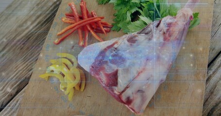 Showing bone-in meat with pepper strips and parsley on outdoor table via grid overlay, copy space