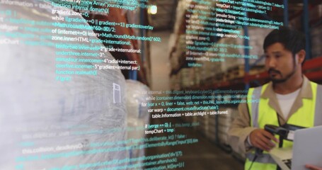 Operator wearing yellow vest scanning inventory holding scanner and laptop in warehouse aisle