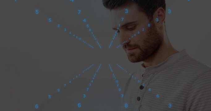 Man examining blue holographic numerals around head against off-white wall in studio, copy space