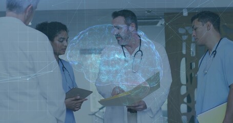 Standing patient in jacket and staff in scrubs examining brain hologram in clinic hall, with tablet