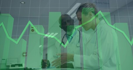 Pointing two doctors with stethoscopes analyzing patient chart at nursing station with data overlay
