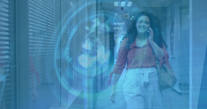 Woman talking on smartphone in office hallway, with holographic globe digital overlay, copy space - Powered by Adobe