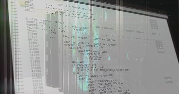 Showing computer monitor displaying SQL database commands in data center, with rack reflections