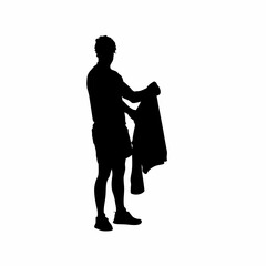 Silhouette of a rehab worker folding towels after therapy isolated on white background