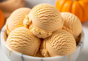 Delicious scoops of creamy pumpkin spice ice cream in a bowl