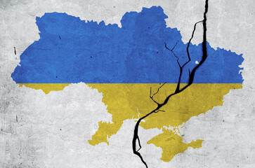 map of Ukraine painted on an old wall with the colors blue and yellow of the flag