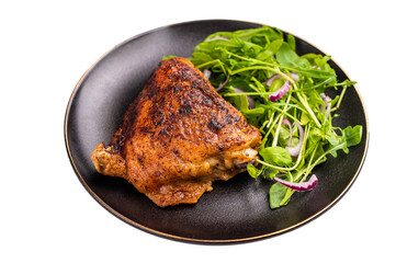 BBQ grilled chicken thigh with with green salad on a plate isolated on white background. top view