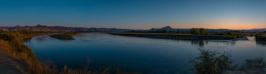 Panoramic hdr view of river landscape at sunset natural environment