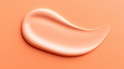 A gentle, creamy lotion smear rests on a vibrant orange background, showcasing a smooth and delicate texture that evokes a sense of comfort and tranquility, perfect for skincare