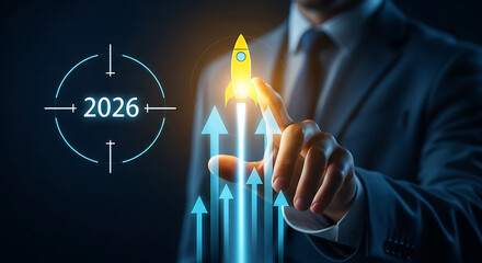 Businessman touching a rocket launching towards a target with the year 2026, representing business growth and aiming for future goals