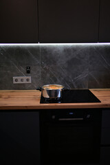 Soup boiling on electric cooktop