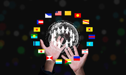 Hands supporting a digital globe with glowing people and international flags symbolizing global unity, teamwork, and international cooperation in technology and business connection.