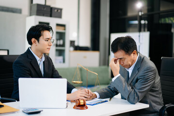Lawyer comforting upset client during business meeting, symbolizing empathy, legal support, and emotional guidance