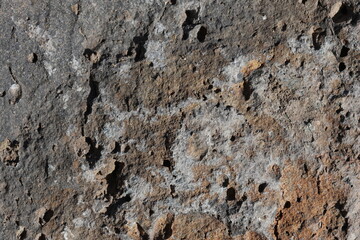 Macro View of Basalt Stone Surface Texture. Rough Surface of Natural Basalt Stone in Focus