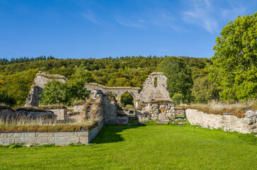 Ruins of Alvastra Abbey during autumn. This Cistercian monastery was founded in 1143 at Alvastra in county Östergötland, Sweden