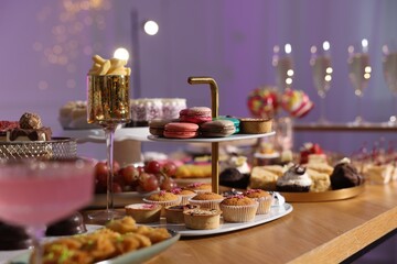 Buffet menu. Different delicious desserts on table, selective focus