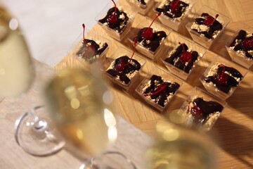 Buffet menu. Delicious desserts and drinks on table, selective focus