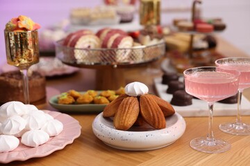 Buffet menu. Delicious desserts and drinks on table, selective focus