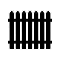 Silhouette of wooden fence with pointed tops, commonly used in gardens